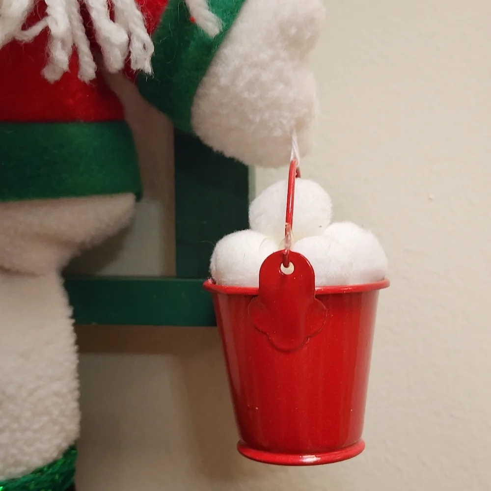 Red and Green Wood Wall Or Shelf Decor Plush Snowman With Pail Of Snowballs
